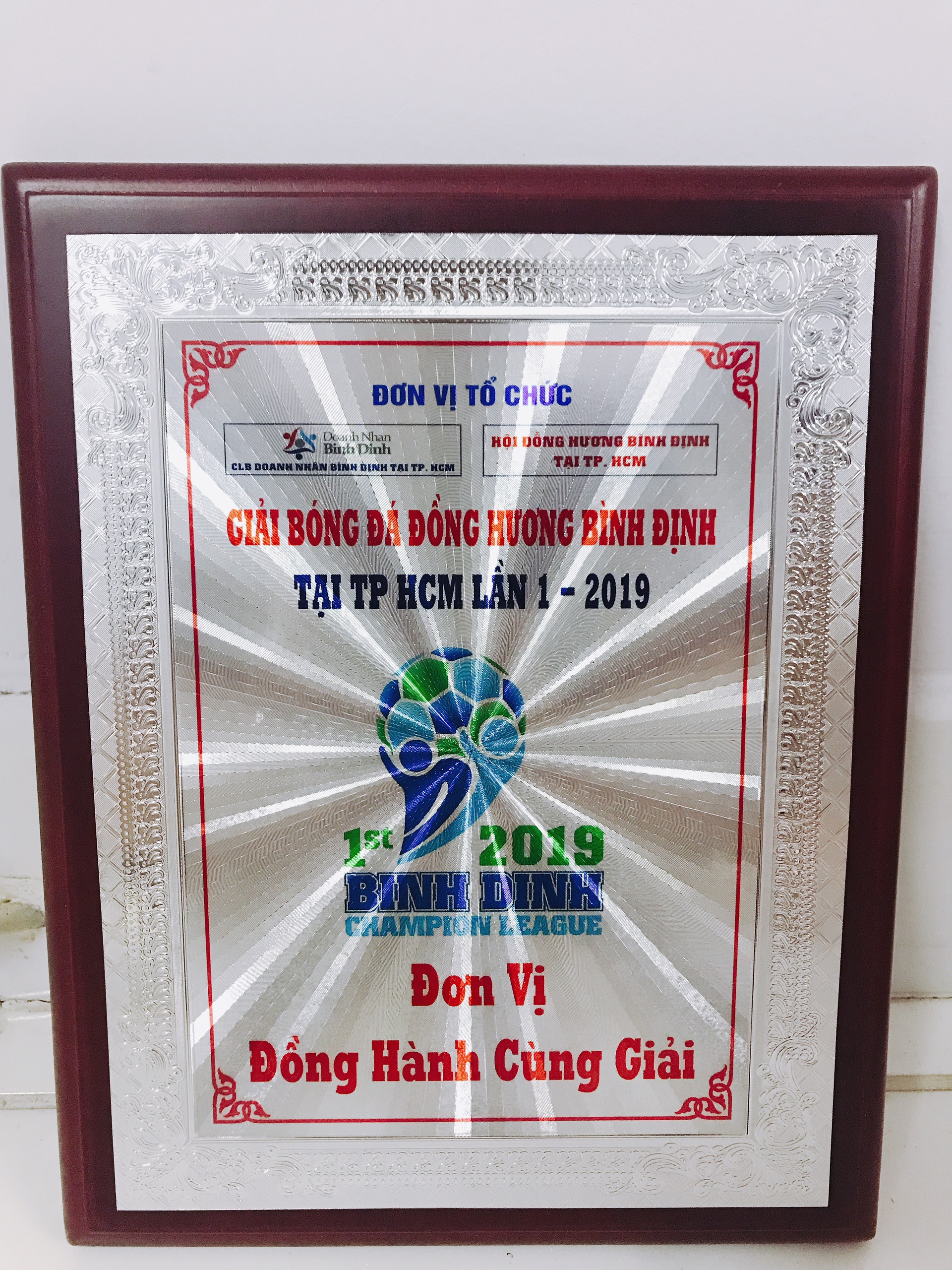 kỷ niệm chương giấy tráng kim